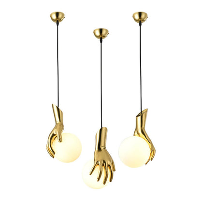 Hand Holding Globe Pendant Light